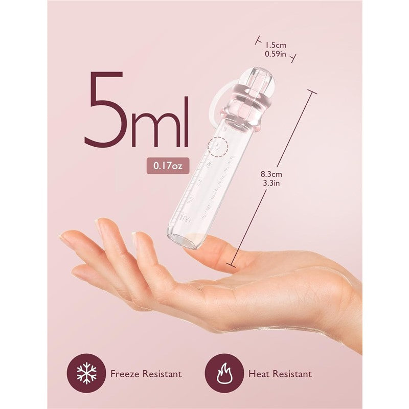 Reusable breast milk collector from Momcozy, 5ml capacity, freeze and heat resistant, shown in a hand for scale.