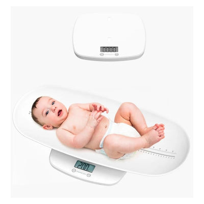 Multi-function baby scale with an infant lying on it, displaying a weight of 2.00 kg on a digital screen.