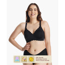 Seamless black floral push-up nursing bra on a model showcasing adjustable straps and scalloped edges, with award seals below.