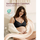 Seamless black floral push-up nursing bra worn by a smiling pregnant woman, showcasing comfort and softness.