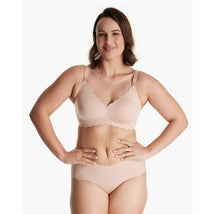 Momcozy Seamless Floral Push Up Nursing Bra in Oyster Pink, worn by a smiling woman, showcasing its smooth design and adjustable straps.