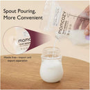 Temp-sensing breastmilk storage bag from Momcozy pouring milk into a glass jar, highlighting convenience and ease of use.