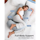 U-shaped cooling fabric pregnancy pillow designed for full-body support, shown with a woman resting peacefully.