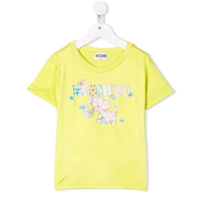 Lime green Moschino Baby dress featuring a colorful elephant graphic and floral accents.