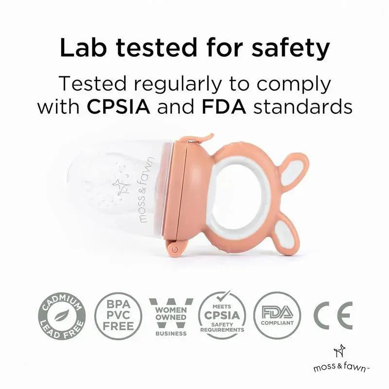 Soothing silicone baby food feeder with a pink handle, tested for safety, and compliant with CPSIA and FDA standards.