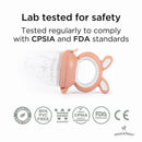 Soothing silicone baby food feeder with a pink handle, tested for safety, and compliant with CPSIA and FDA standards.