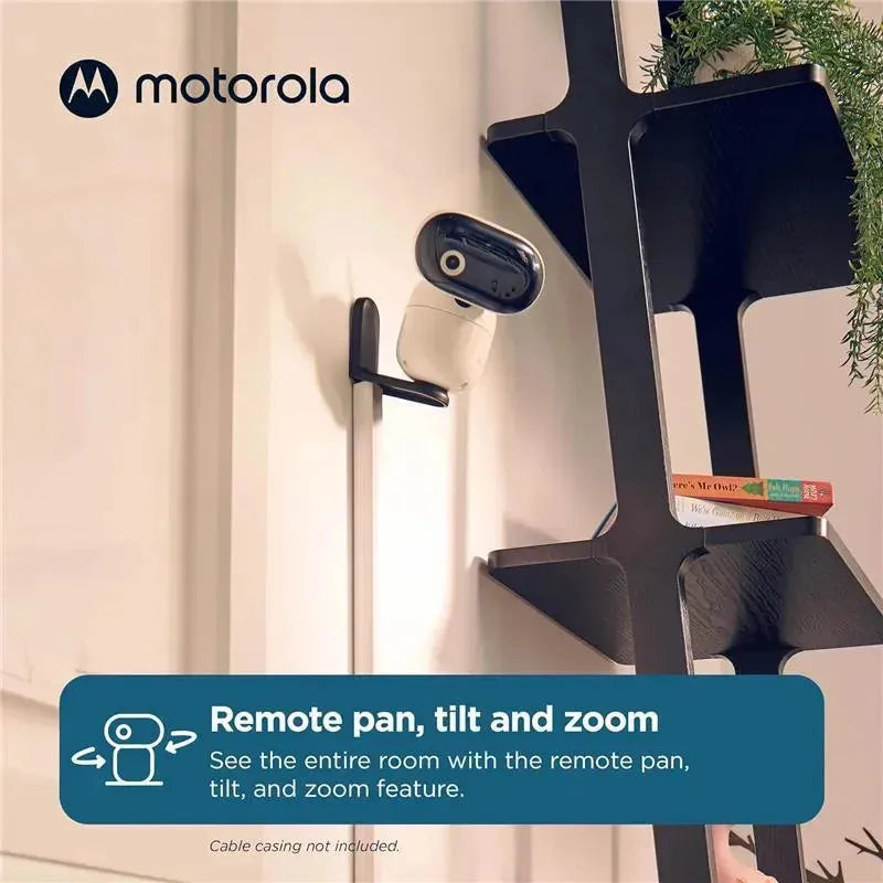 Motorola 5 Motorized Video Baby Monitor mounted on a wall, featuring pan, tilt, and zoom functionality.
