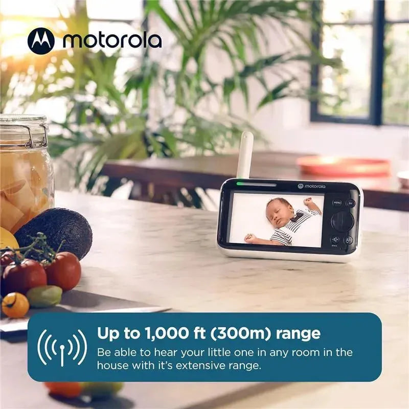 Motorola 5 Motorized Video Baby Monitor displaying a baby on its screen, with a range of up to 1,000 ft.