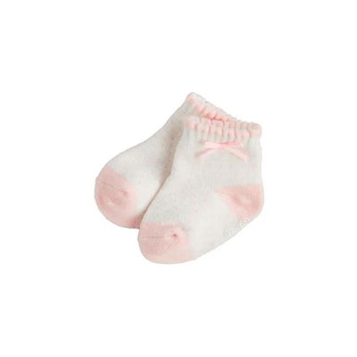 Pink baby socks with a dot pattern and a small bow on the cuff, designed for baby girls.