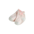 Baby girl socks by Mud Pie, featuring pink and white stripes with a ruffled top and a pink bow detail.