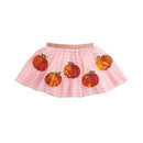 Baby girl tutu featuring sequin pumpkins on a pink gingham skirt with a metallic waistband.