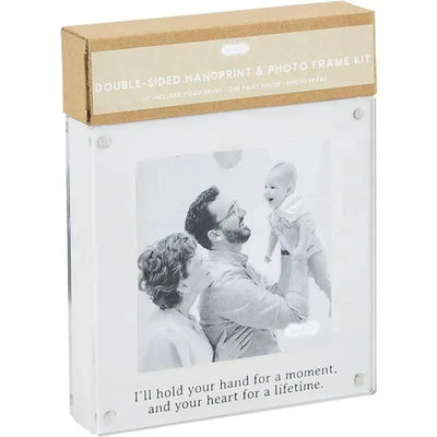 Double-sided baby handprint and photo frame kit featuring a photo of a smiling family holding a baby, with an inspirational quote.