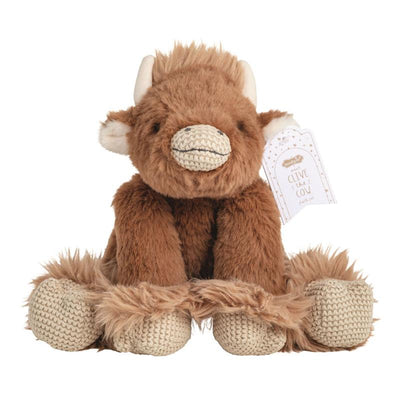 Brown plush cow toy named Clive, featuring a soft body, crocheted hooves, and a tag with product details.
