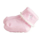 White cross foldover baby socks in pink with a decorative white pom-pom trim, size 0-6 months.
