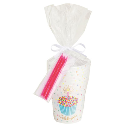 Birthday cup set featuring a cupcake design, colorful sprinkles, and pink candles, packaged in cellophane with a bow.