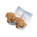 Crochet rattle toe socks for infants, featuring a design of two brown dog heads on a light blue and white sock.