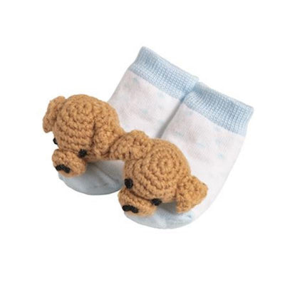 Crochet rattle toe socks for infants, featuring a design of two brown dog heads on a light blue and white sock.