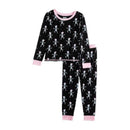 Toddler pajamas featuring a pink skeleton design on a black background with pink trim.