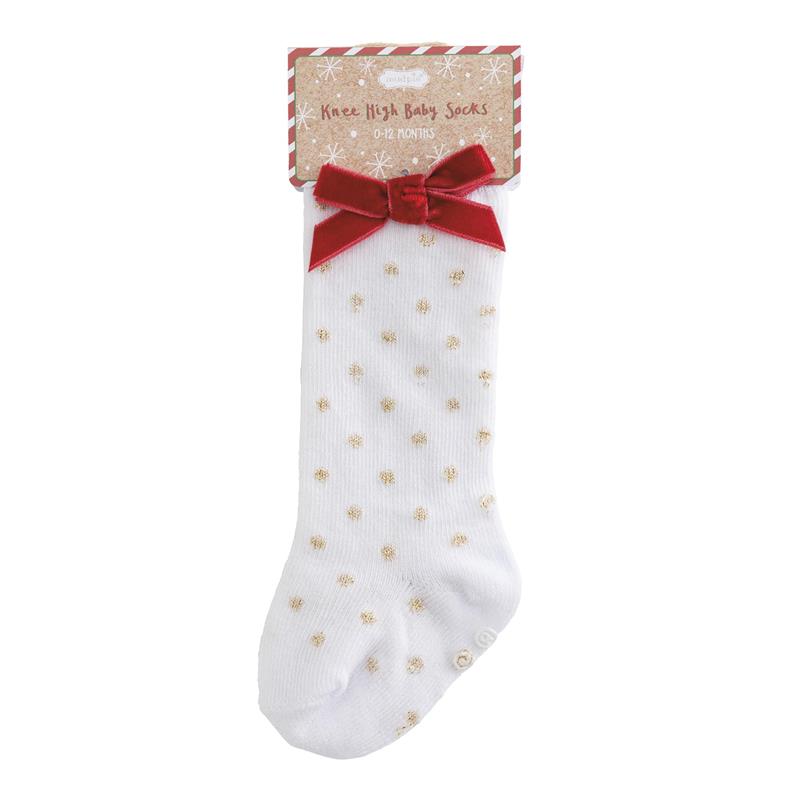 Knee-high white baby socks for 0-12 months with gold dot patterns and a red velvet bow at the top.
