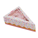 Light pink birthday jewelry set in a cake slice box, featuring heart-shaped charms and pearl accents.