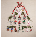 Red Bow Frame Ornament displayed as part of a Christmas tree arrangement with various seasonal ornaments and photo frames.