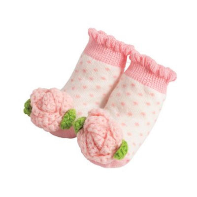 Rose-themed crochet rattle toe socks for infants, featuring pink and white polka dots and flower embellishments.
