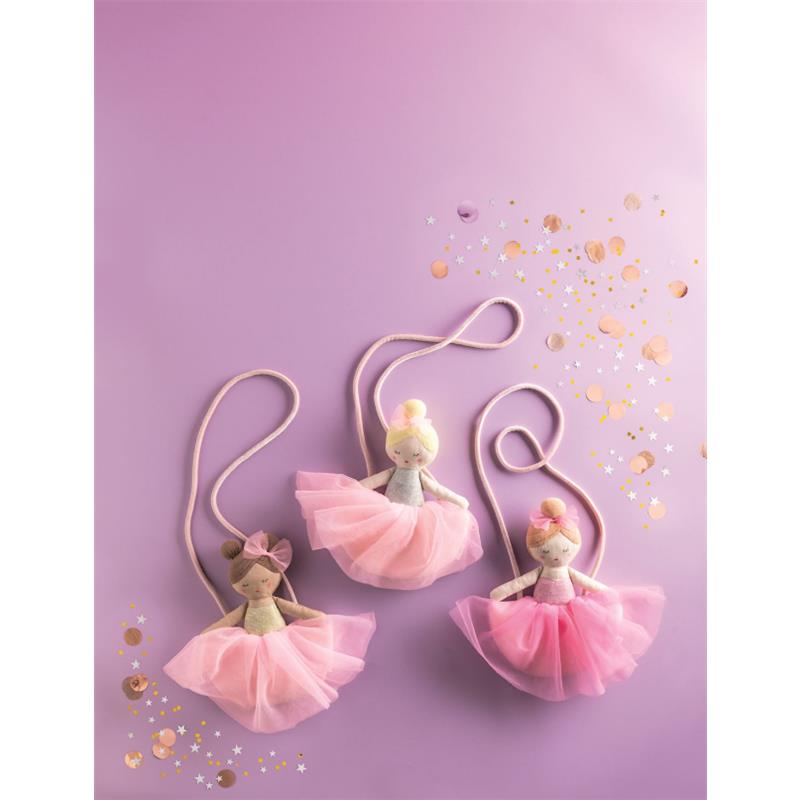 Three tulle ballerina purses in pink and blonde designs with straps, set on a purple background with decorative confetti.