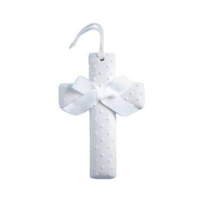 Ceramic white cross with raised dot texture and a white satin bow, designed for decorative purposes.