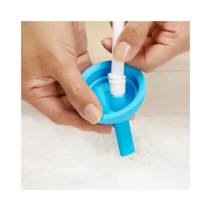 Hands assembling the Munchkin 10Oz Simple Clean Straw Cup in blue, focusing on the straw insertion into the cup.