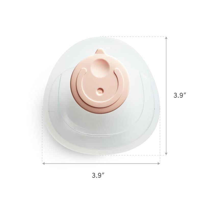 Silicone breastmilk collector cup, designed for easy storage, featuring a rounded top with a pink cap, dimensions 3.9 inches.