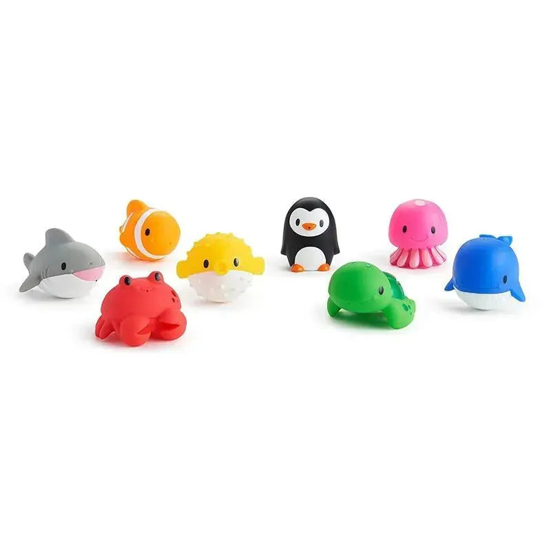 Set of eight colorful ocean-themed squirt toys, including a shark, clownfish, penguin, and octopus, ideal for bath time fun.