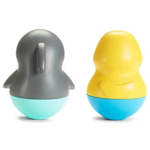 Munchkin bath toy set featuring a gray dolphin and a yellow walrus, designed to be mold-free for safe play.