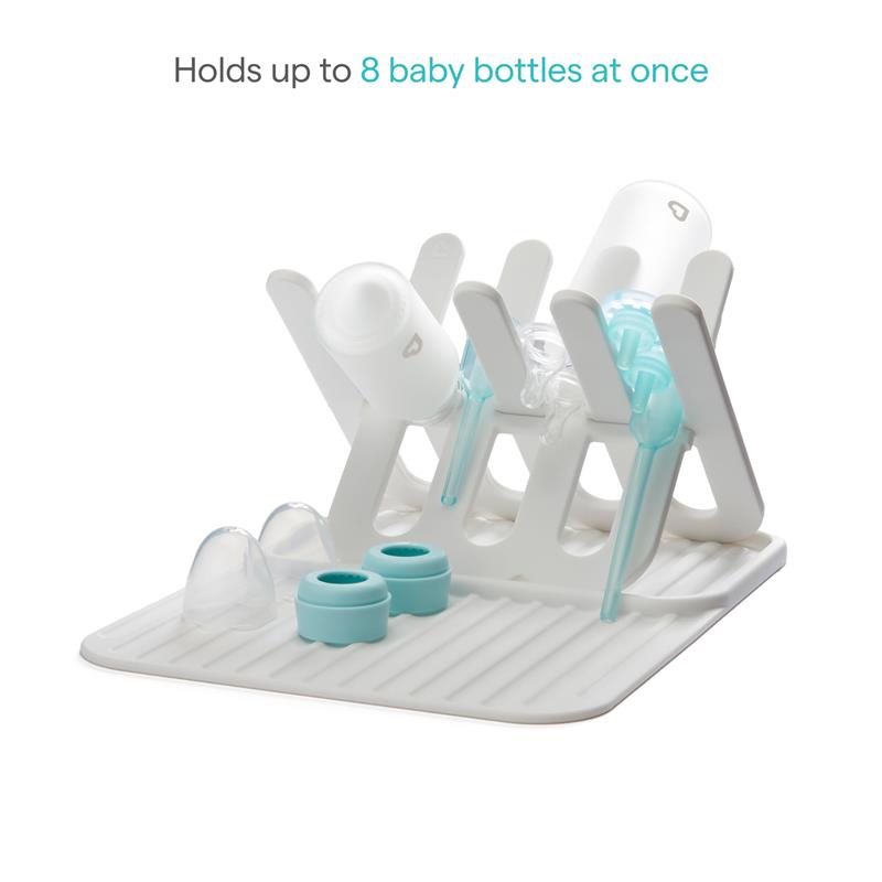 Munchkin Bottle Drying Rack and Mat in white, featuring slots for drying up to 8 baby bottles and components.