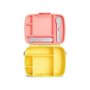 Munchkin Lunch Bento Box in yellow and pink with stainless steel utensils, featuring multiple compartments for food storage.
