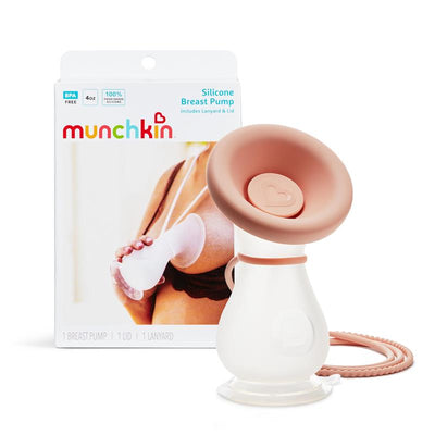 Munchkin Manual Breast Pump in clear and pink, with packaging showing a woman using the pump. Includes lanyard and lid.