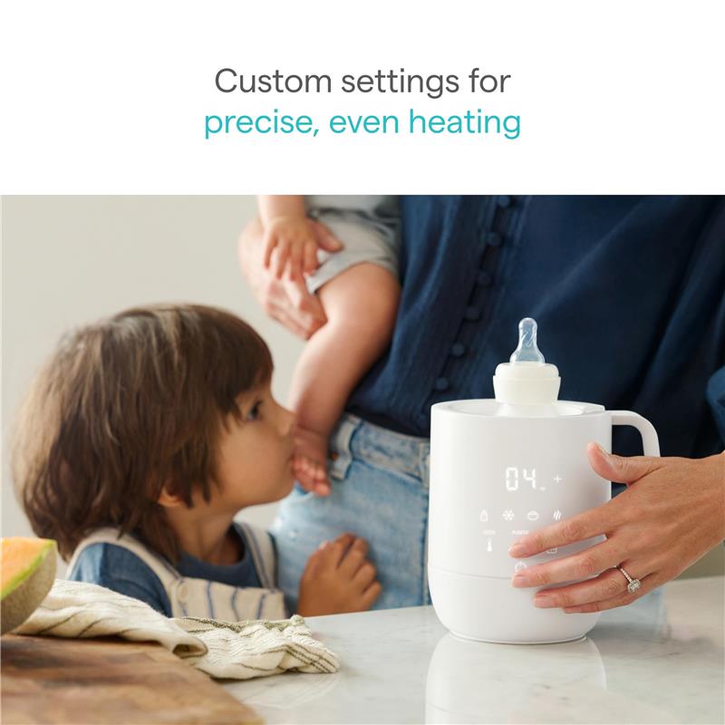 Munchkin Precision Baby Bottle Warmer in white, featuring a digital display and a baby bottle positioned on top, with a parent and child nearby.