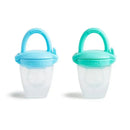 Silicone baby food feeders in blue and mint, designed for infants to safely enjoy solids and purees.