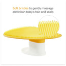 Silicone baby bath brush with soft yellow bristles for gentle hair and scalp cleaning, featuring a soap dispenser.