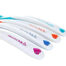 Munchkin White Hot infant spoons in a 4-pack, featuring colorful handles with heart designs and the brand name.