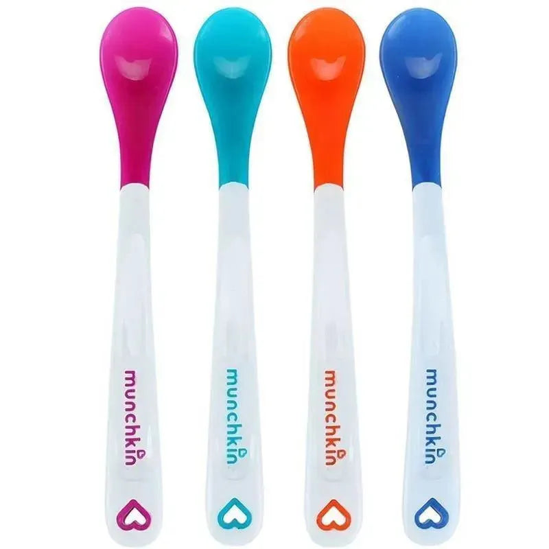 Four Munchkin infant spoons in pink, turquoise, orange, and blue, designed for feeding babies.
