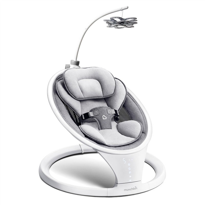 High-contrast Munchkin Baby Bloom Mobile attached to a grey infant swing, designed to engage babies visually.
