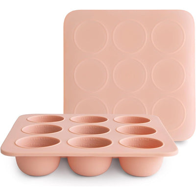 Mushie Baby Food Freezer Tray in blush color with eight round compartments for portioning baby food.