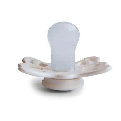 Cream and blush silicone pacifier shaped like a butterfly, designed for infants 0-6 months.