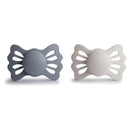 Two symmetrical silicone pacifiers in gray and silver gray, designed for ages 6 to 18 months.
