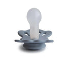 Silicone pacifier in Great Gray and Silver Gray, designed for babies aged 6-18 months, featuring a symmetrical shape.
