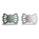 Two silicone pacifiers in sage and silver gray colors, designed for infants aged 6 to 18 months.