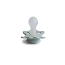 Sage and silver gray silicone pacifier with a symmetrical design, suitable for babies aged 6 to 18 months.