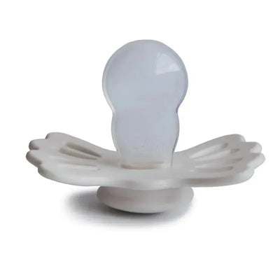 Lucky symmetrical silicone pacifier in silky satin cream color for babies aged 6 to 18 months.
