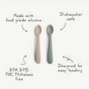Silicone feeding spoons in Cambridge Blue and Shifting Sand, made from food-grade silicone, dishwasher safe, BPA-free.