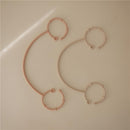 Adjustable silicone straps in blush and shifting sand colors, designed for securing items, displayed flat on a light background.